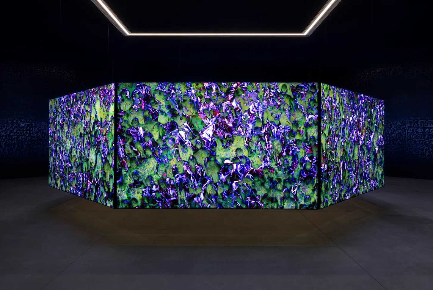 Eight-sided video mapped painting installation conference of one's self by Khaled Sabsabi in Australia Pavilion